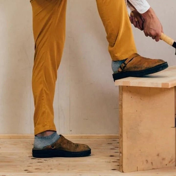 Fashionable men's casual slip-on mules with a heel strap, combining easy wear with all-day comfort.