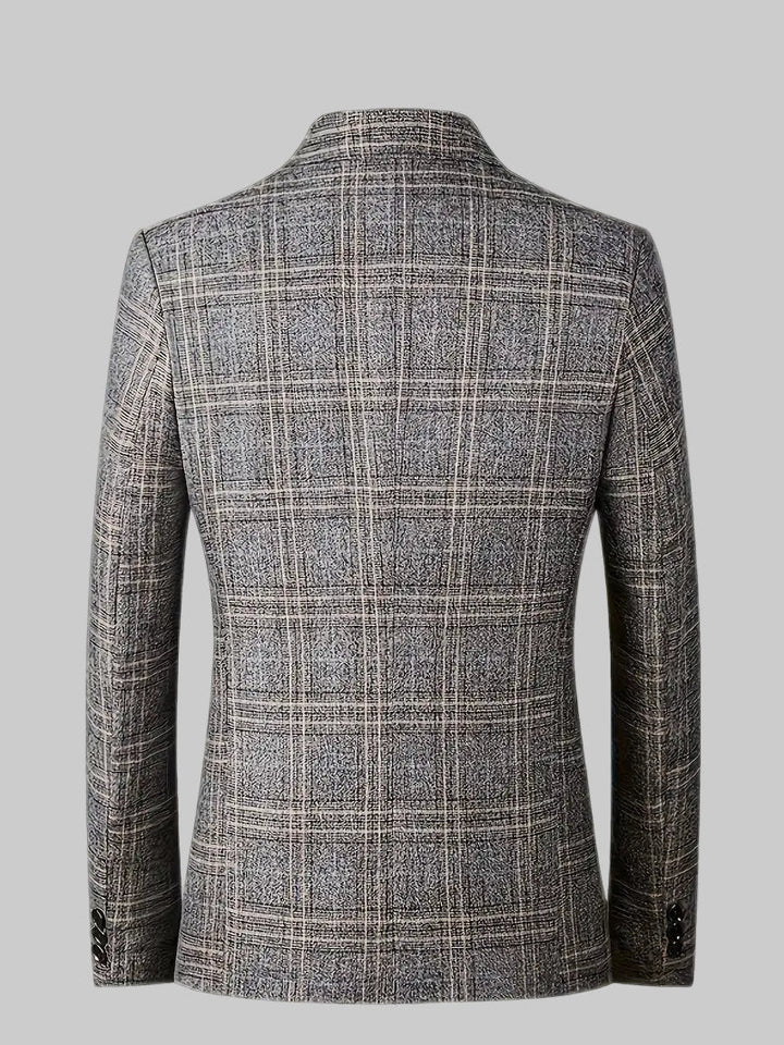 Fashionable men's checked blazer jacket, offering a smart heritage style for modern men's fashion.