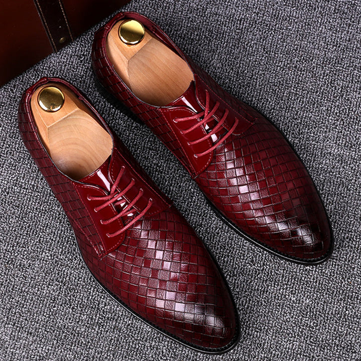 Men's classic black leather lace-up dress shoes, perfect for formal occasions & office wear. Timeless style.