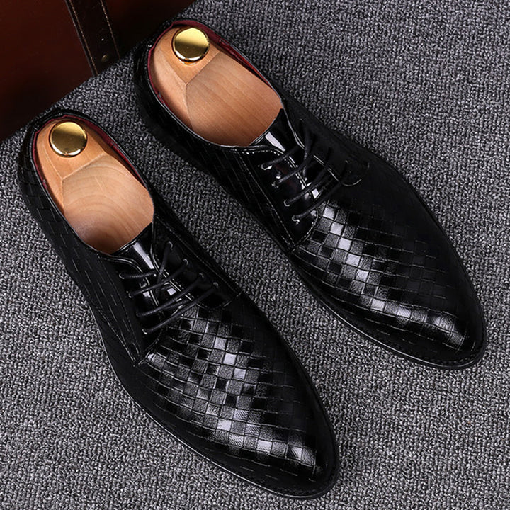 Close-up of elegant men's high-quality leather lace-up dress shoes. Classic design for discerning gentlemen.