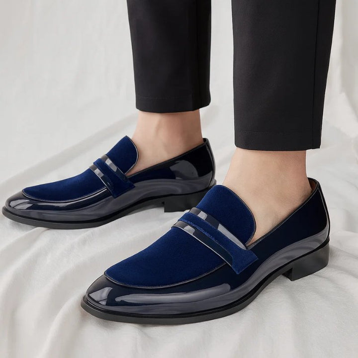 Versatile men's slip-on penny loafers in brown leather, perfect for smart casual or dressy occasions.
