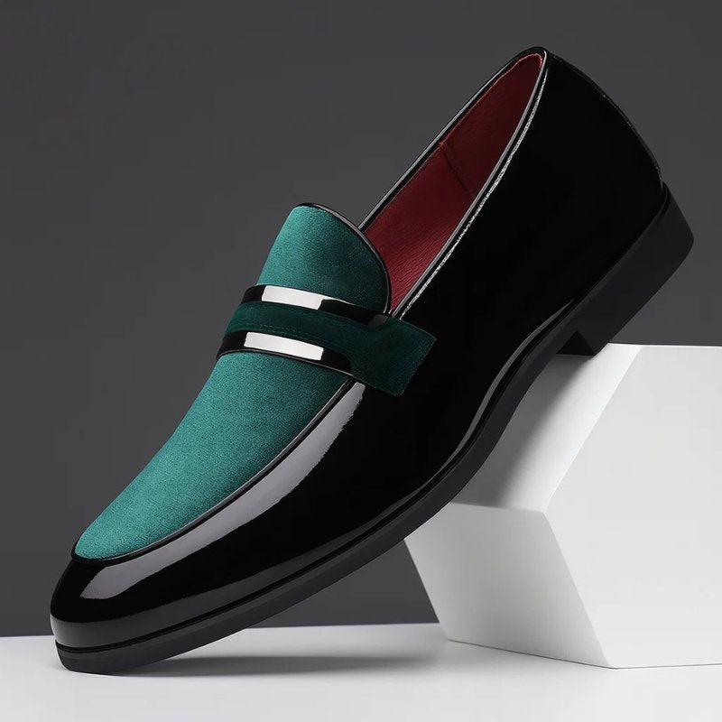 Close-up of men's premium leather penny loafers, showcasing classic design and quality craftsmanship.