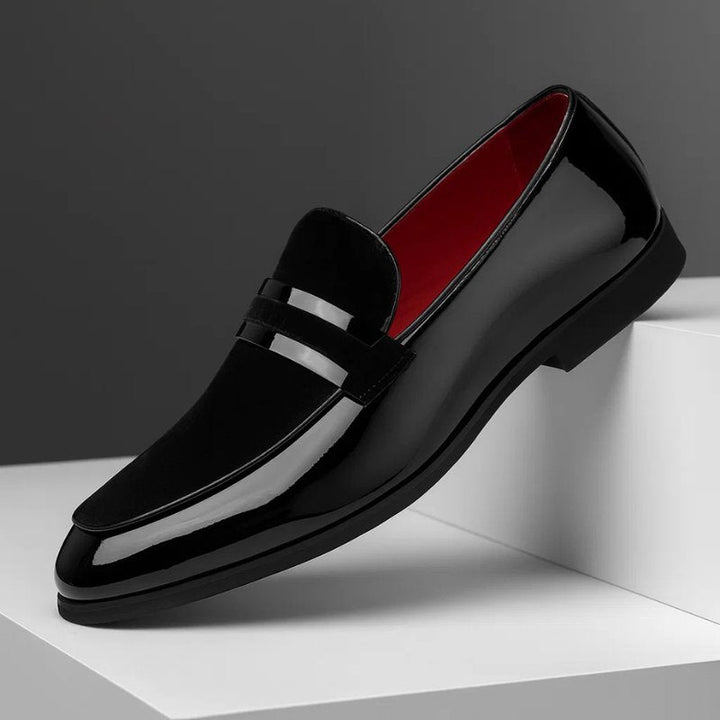 Men's comfortable penny loafers worn on foot, showing versatile slip-on design for various outfits.