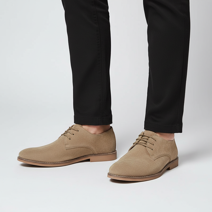 Side view of men's elegant black Oxford lace-up shoes, versatile for formal, business, or smart casual attire.