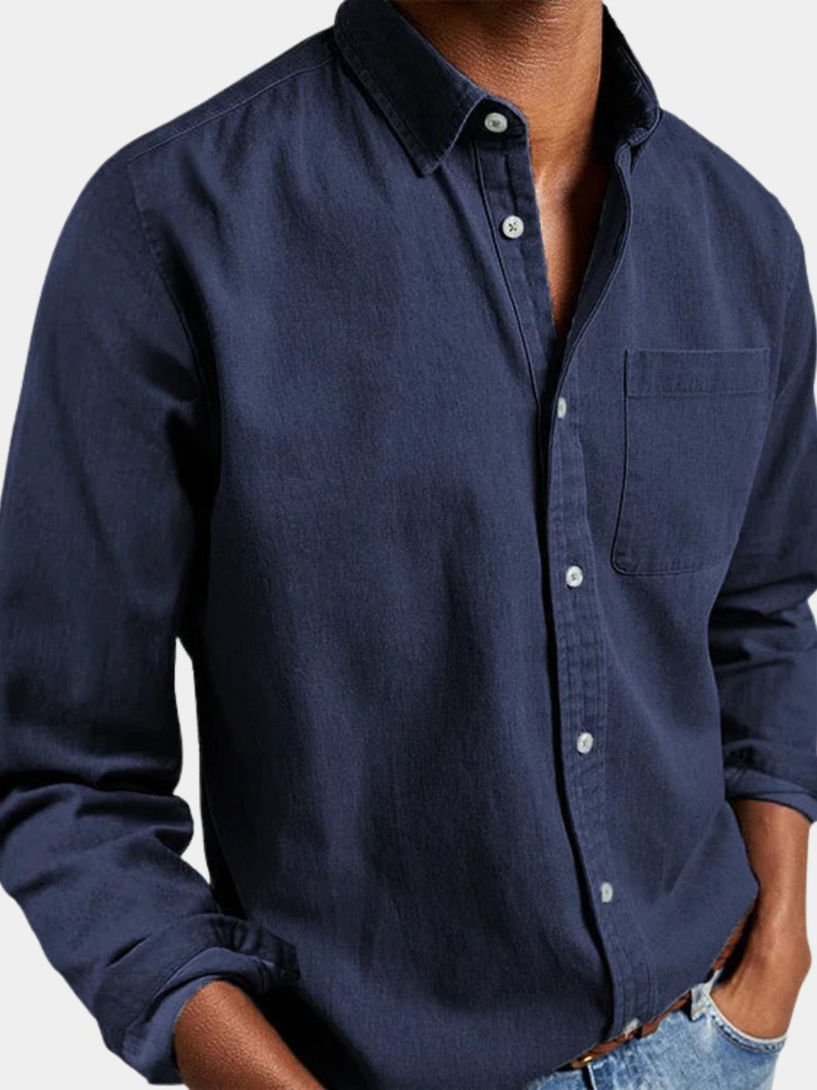 Men's classic blue denim button-up shirt, long sleeve, a versatile menswear essential for everyday wear.