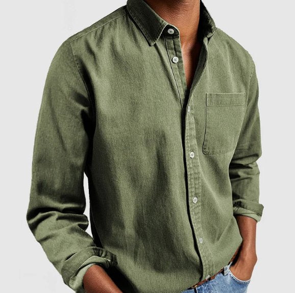 Stylish man wearing a casual long sleeve denim button-up shirt, perfect for versatile everyday fashion.