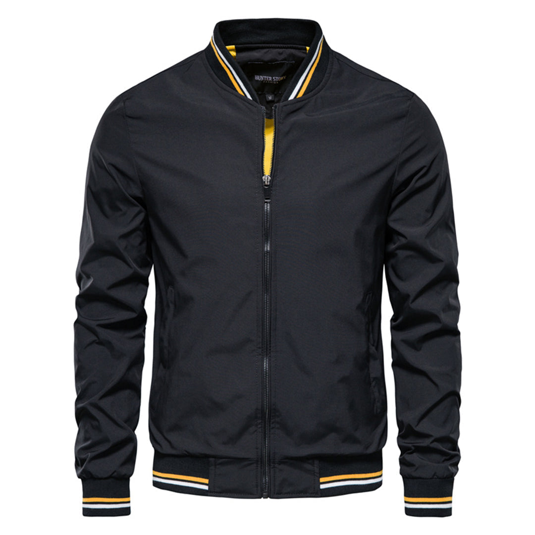 Close-up: Men's bomber jacket's ribbed collar & cuffs, showcasing quality details and classic style.