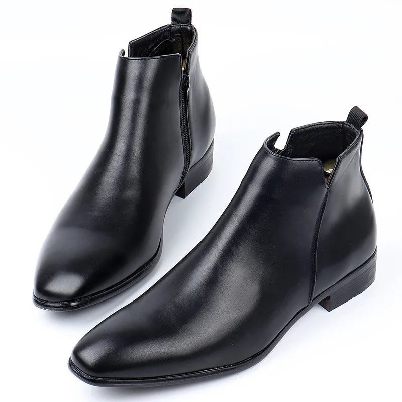 Men's classic brown leather Chelsea boots with pointed toe, offering comfort and elegant style for versatile wear.