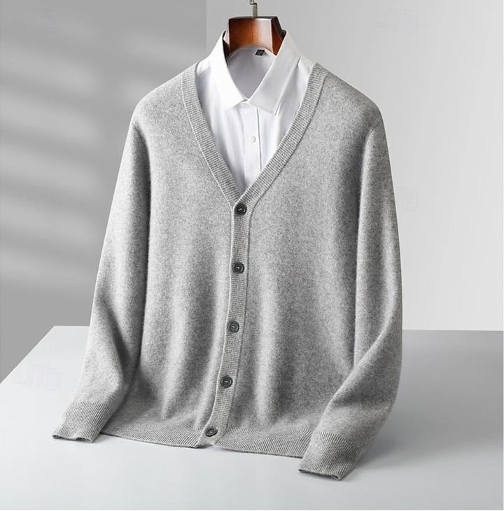Refined men's button-up cardigan, a classic long sleeve sweater perfect for sophisticated smart casual layering.