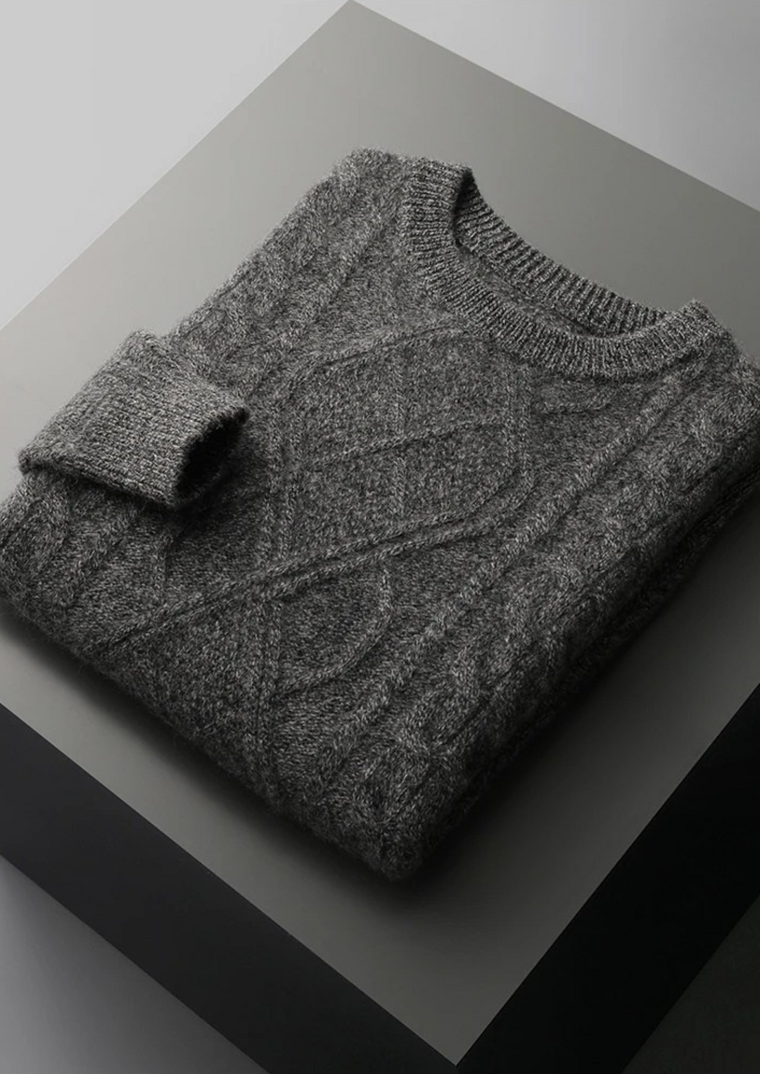 Timeless men's cable knit crew neck sweater, a cozy and warm staple for any winter wardrobe.