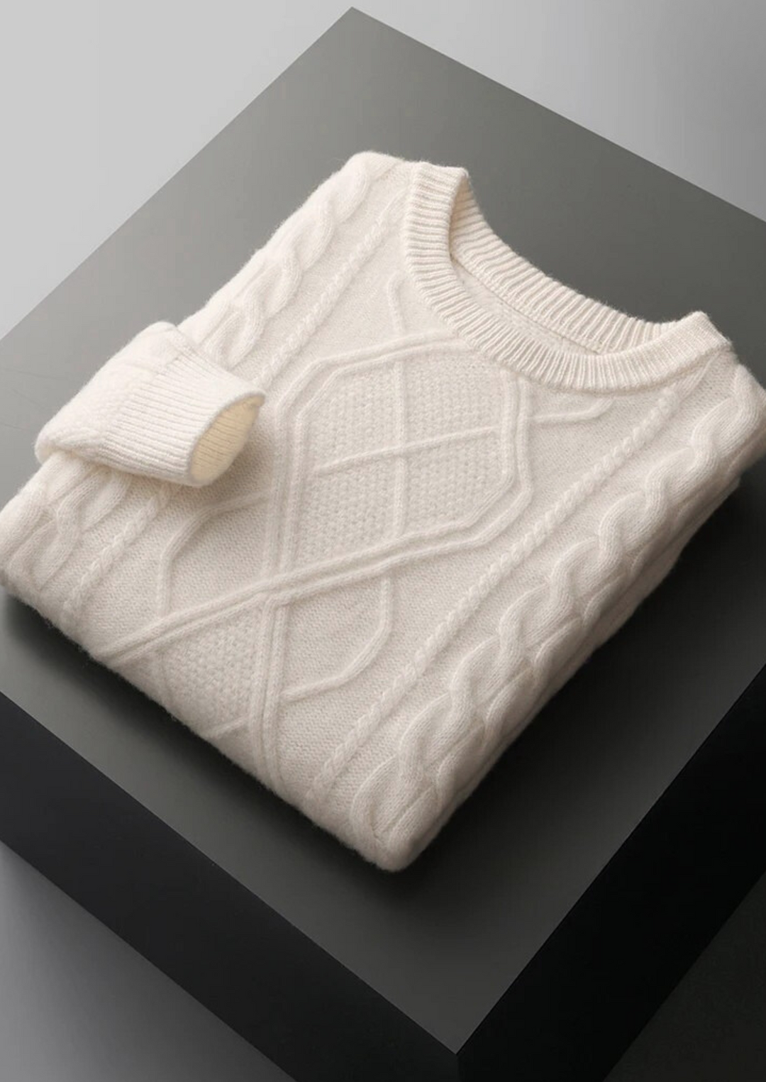 Warm men's crew neck cable knit sweater, a timeless piece for winter fashion, offering comfort & classic style.