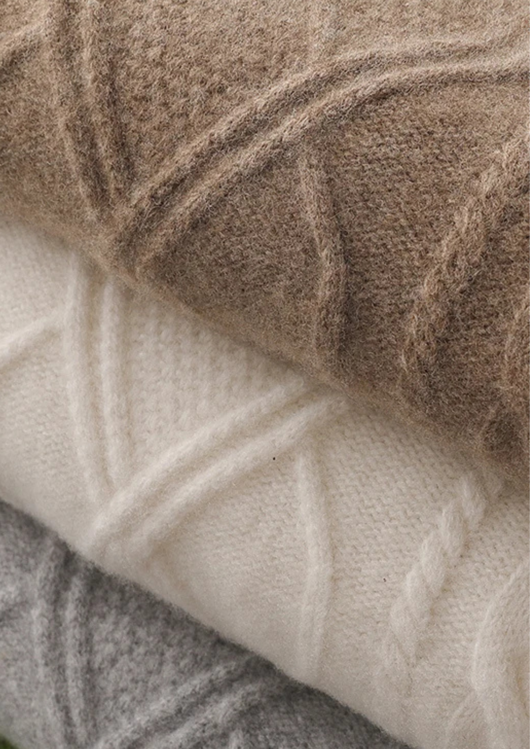 Classic men's cable knit crew neck sweater, perfect for layering or casual wear during colder months.