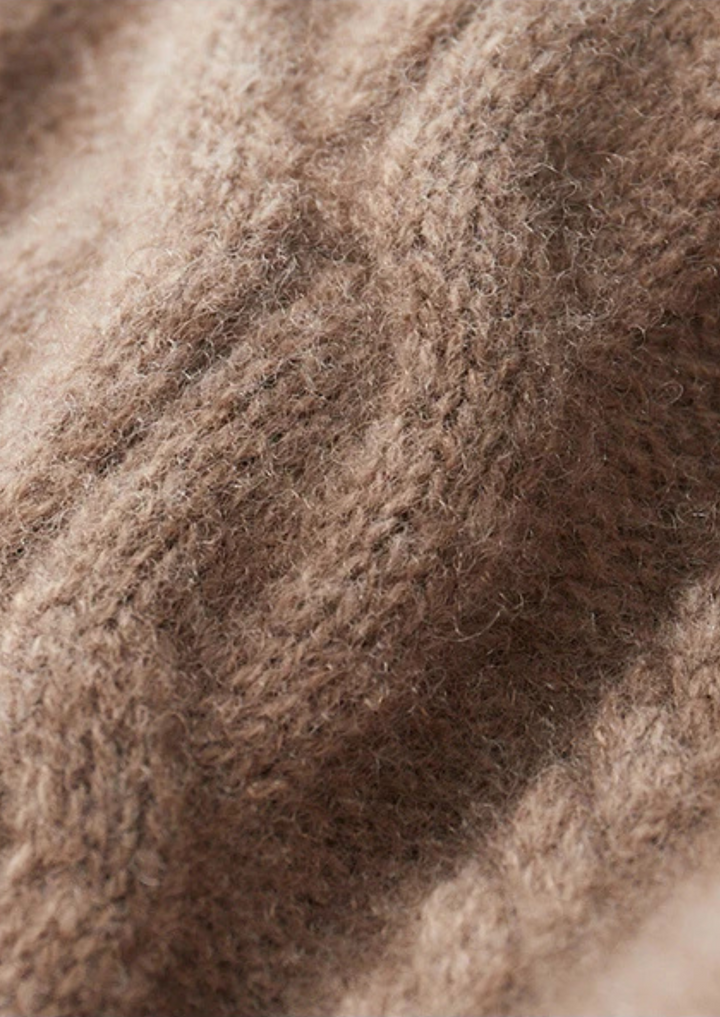 Men's intricate cable knit crew neck sweater. A warm, stylish layering piece for cold weather comfort.