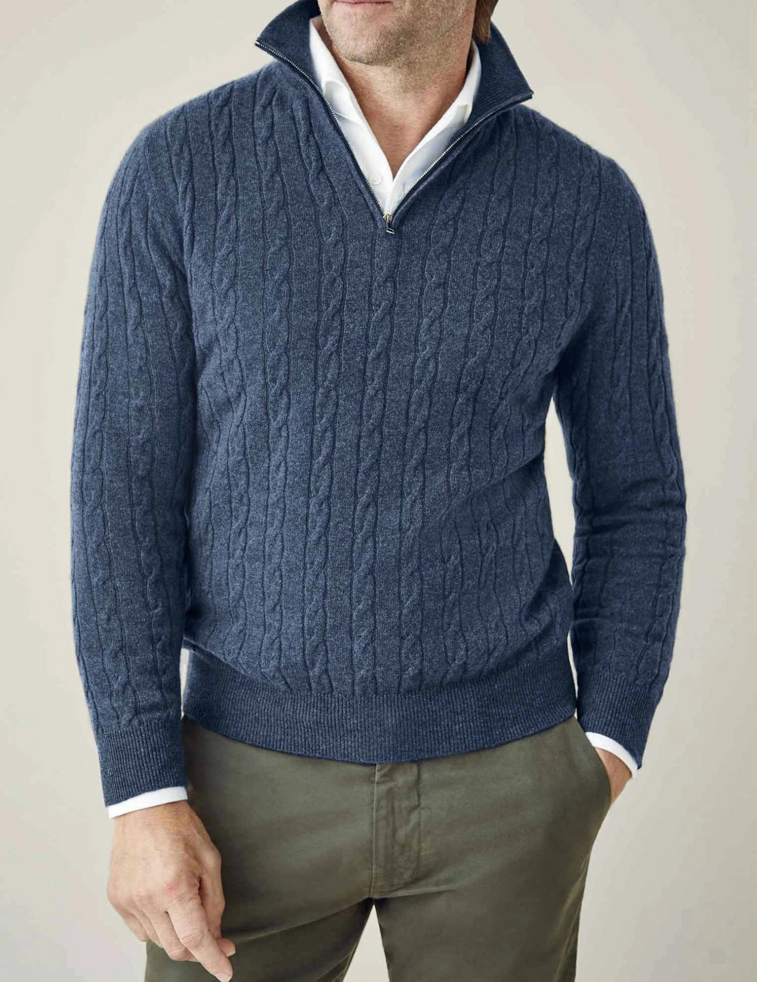 Men's classic cable-knit quarter-zip sweater for warmth and timeless style.