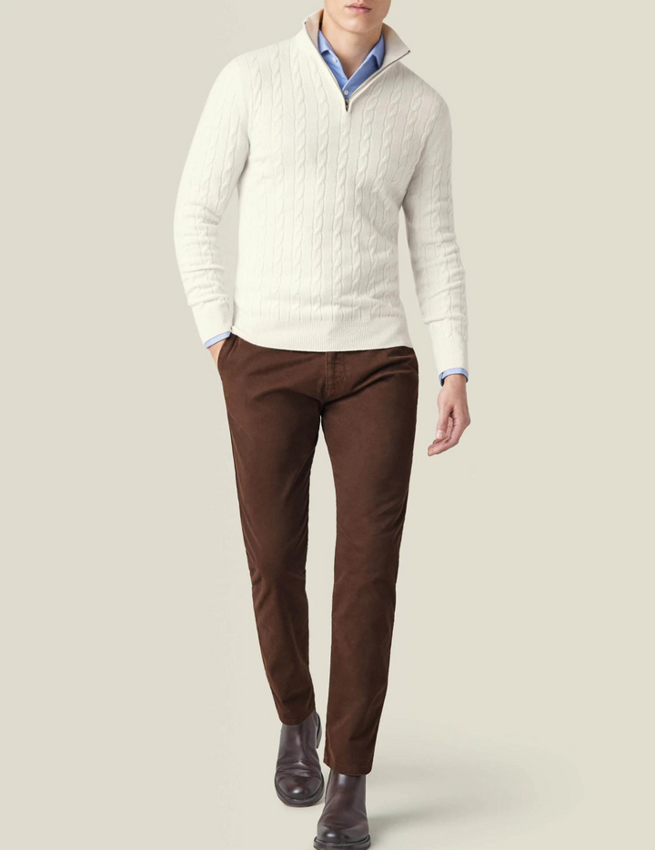 Cozy men's quarter-zip sweater with rich cable-knit texture, providing ultimate warmth.