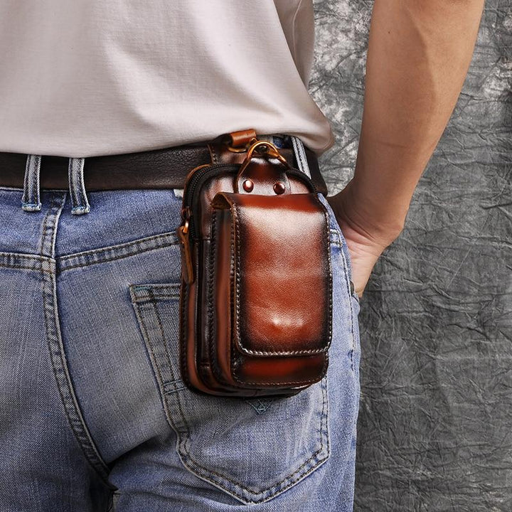 Dark brown men's waist bag, can be worn as a secure crossbody travel pouch for daily essentials.