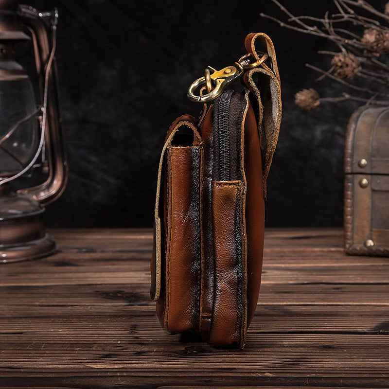 Stylish dark brown men's waist bag, ideal for everyday carry & travel, keeping essentials organized.