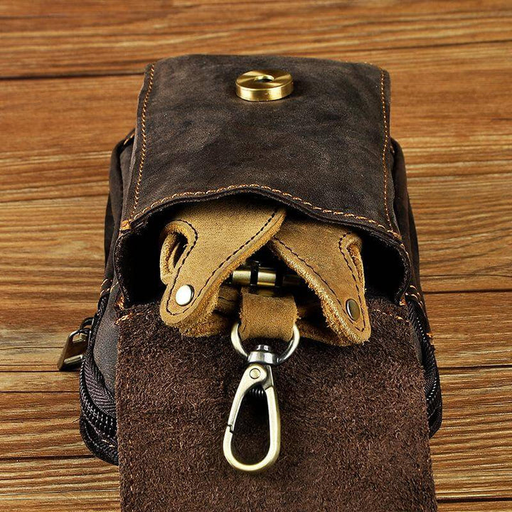 Men's dark brown accessory waist bag, an efficient essentials organizer and secure travel pouch.