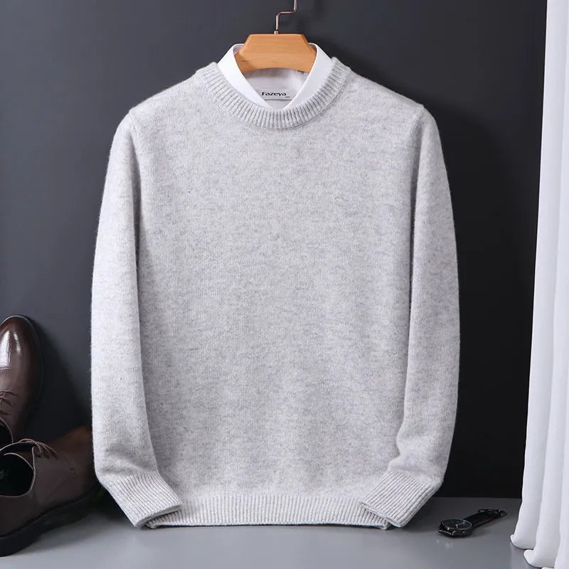Man wearing a comfortable black crewneck sweater, showcasing its smart casual versatility for autumn fashion.