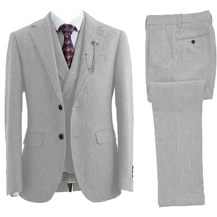Elegant men's formal herringbone 3-piece suit, tailored for a sharp look in business, weddings, or parties.