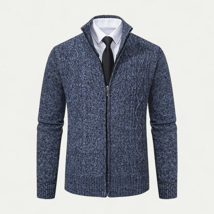 Man wearing a sleek men's knitted zip cardigan, a key piece for modern layering and versatile smart casual outfits.