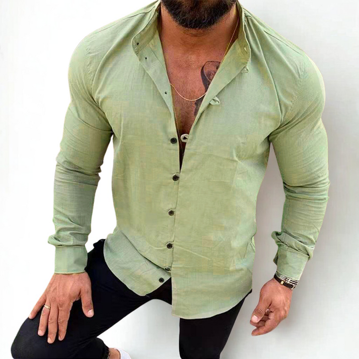 Black men's classic long sleeve polo, button-up style, combining comfort & effortless menswear fashion.