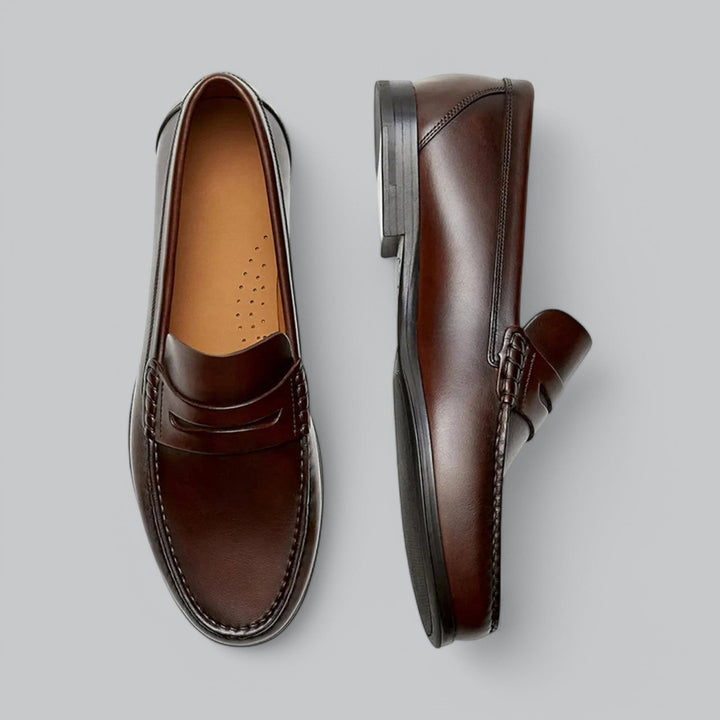 Men's Classic Penny Loafers in rich brown leather, perfect for timeless business casual or formal wear.