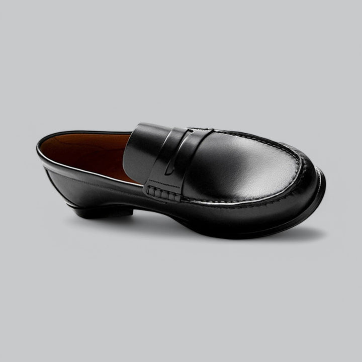 Classic men's fashion penny loafers, providing easy slip-on convenience and a sophisticated look for any man.