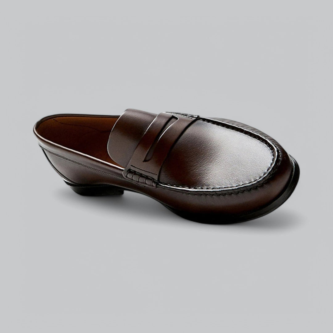 Elegant men's penny loafers with a classic coin slot, sophisticated slip-on dress shoes for any occasion.