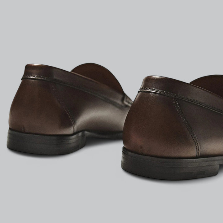Stylish men's formal penny loafers, a must-have for business meetings, events, and a polished men's fashion look.
