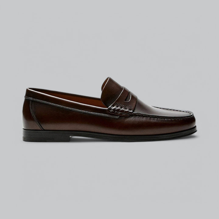 Timeless men's classic penny loafers, offering enduring style and comfortable wear for everyday elegance.
