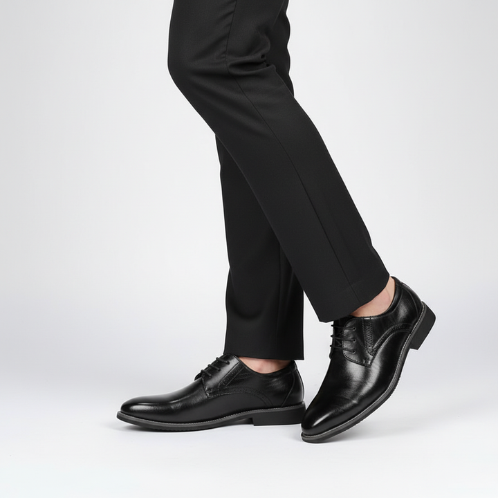 Lace-up men's oxford dress shoes with classic perforated detailing and premium leather upper for versatile style.