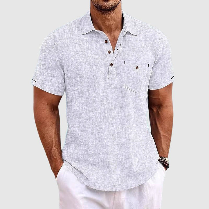 Versatile men's collared polo top with chest pocket; great for casual or semi-formal fashion.