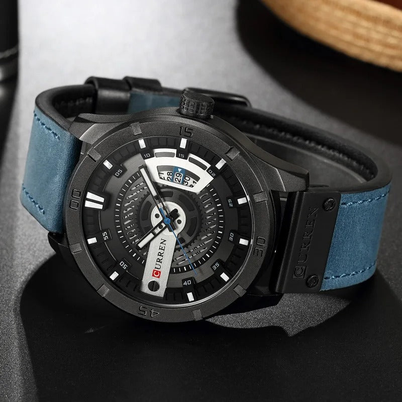 Gentleman's classic quartz watch with a brown leather strap, round alloy case, & a clean, easy-to-read dial. Timeless style.