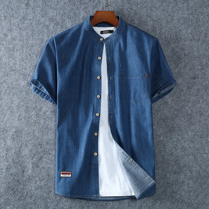 Men's classic short sleeve polo shirt with band collar for smart casual wear. Perfect for summer, effortless style & comfort.