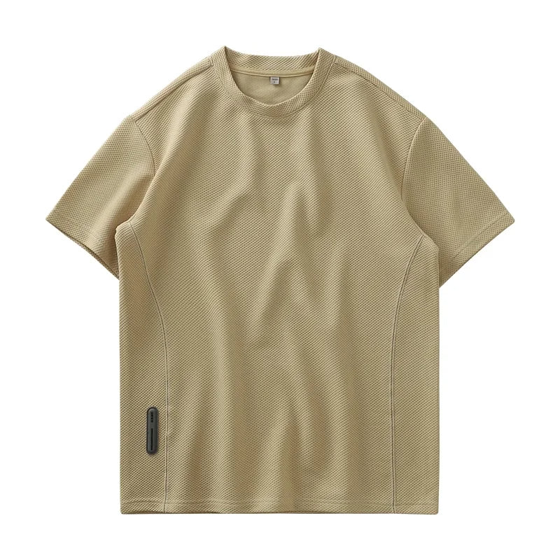 Oversized men's waffle knit t-shirt, short sleeve, perfect for modern streetwear and casual comfort.