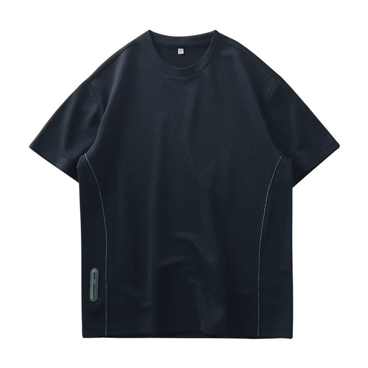 Close-up of a men's crew neck waffle knit t-shirt, showcasing the unique textured fabric detail.