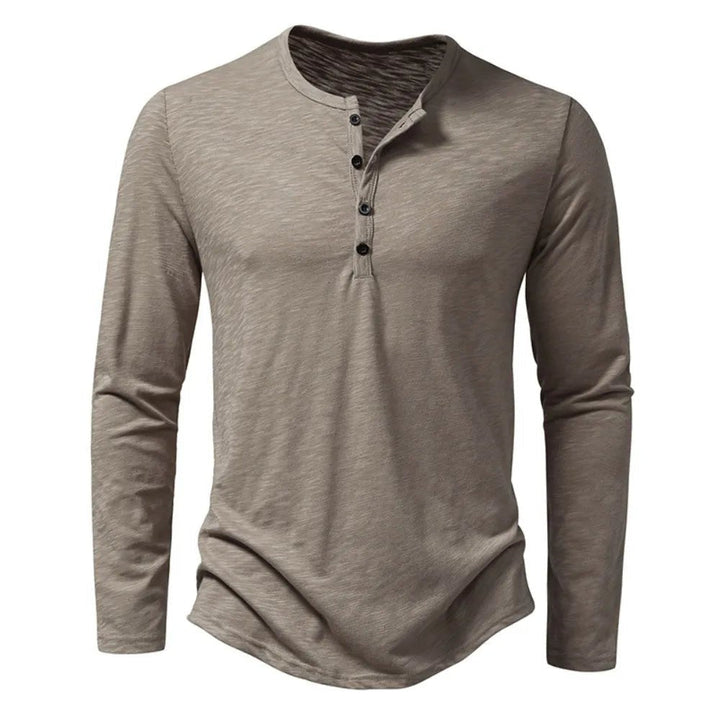 Men's classic slim fit long sleeve Henley shirt, versatile for everyday style & comfort.