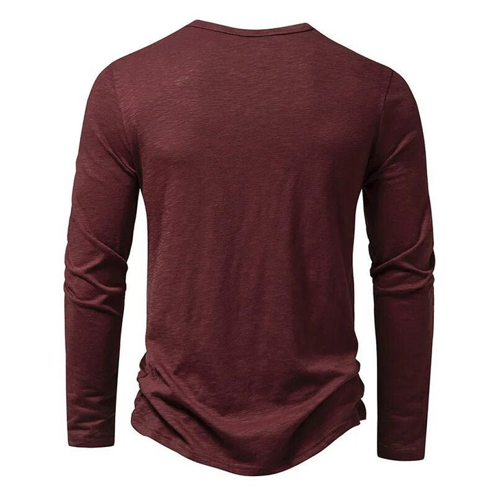 Comfortable men's slim fit Henley shirt, long sleeve, designed for relaxed everyday style and perfect fit.