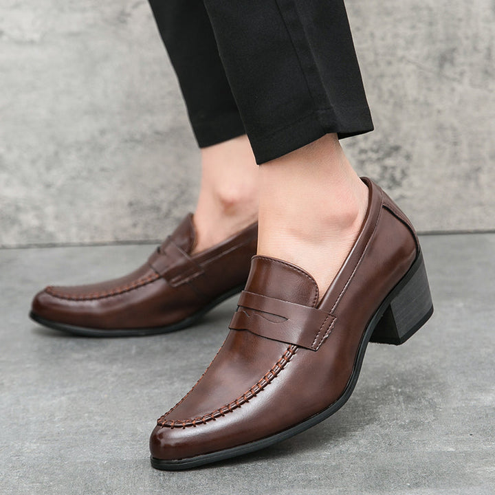 Stylish brown slip-on loafers for men, ideal for casual outfits or business casual work shoes.