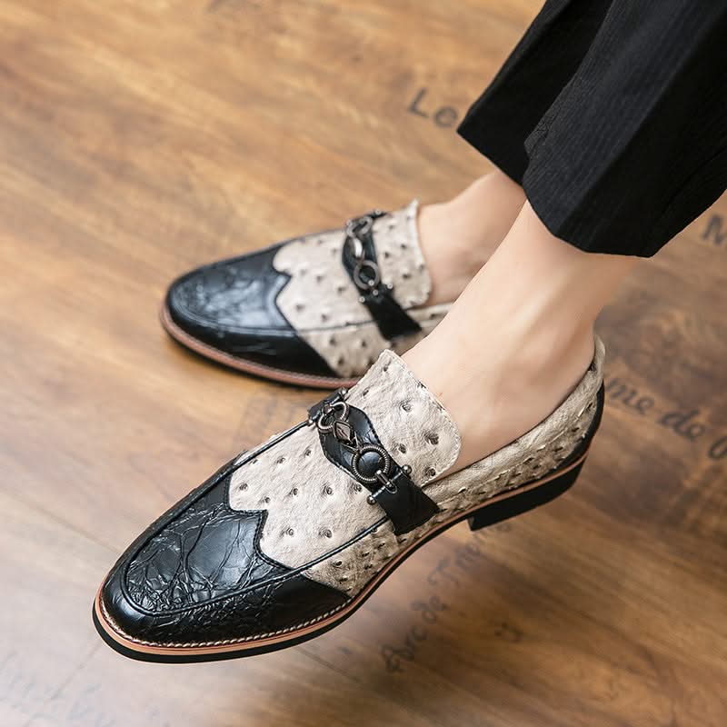 Close-up of the textured detail on classic men's slip-on loafers, highlighting quality & style.