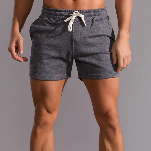 Men's classic fit cotton shorts with elastic waist & drawstring. Soft, breathable, ultimate comfort & casual style.