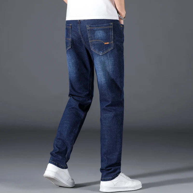 Classic fit men's straight leg blue denim jeans, ideal for comfortable, versatile everyday style.