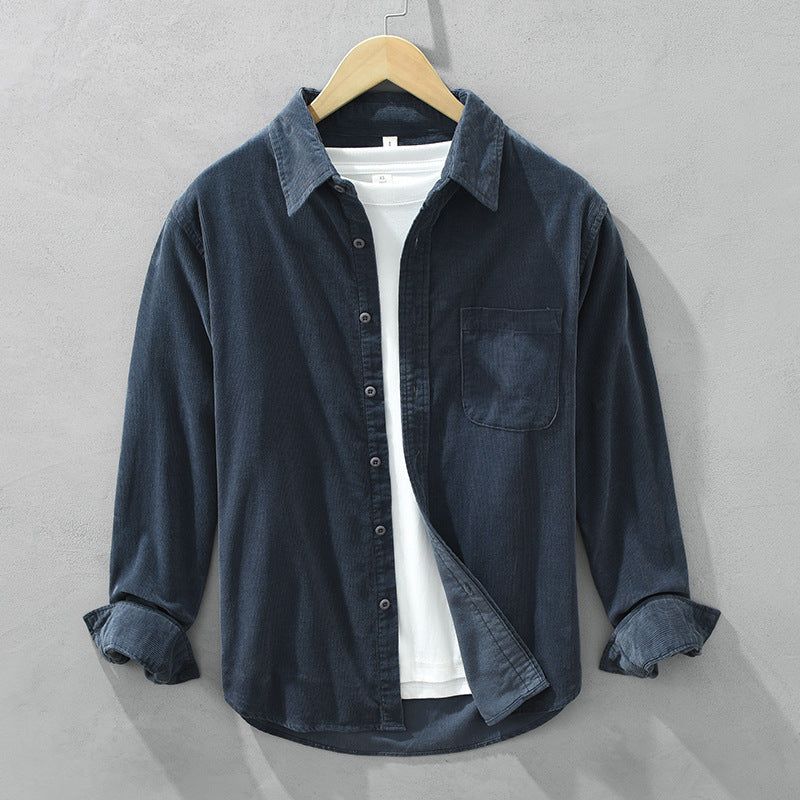 Comfortable men's long sleeve textured shirt. Stylish button-up for autumn, winter, and smart casual outfits.