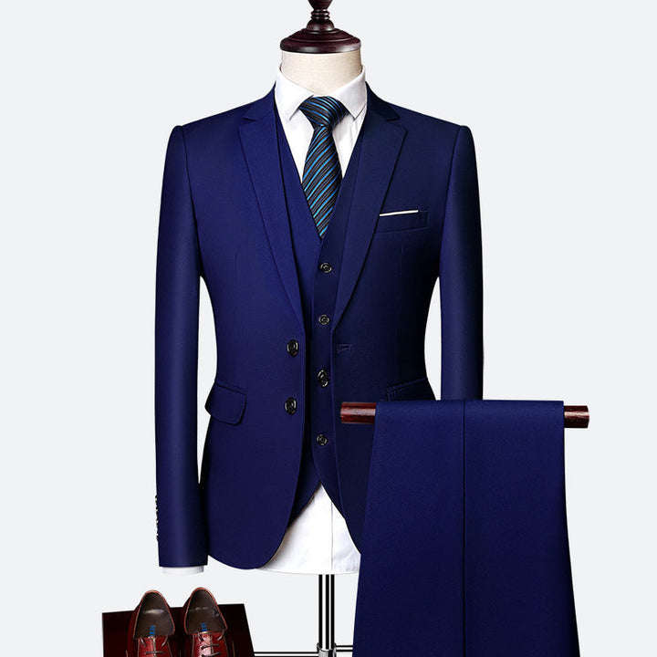 Men's classic three-piece suit, slim fit, tailored for weddings & formal events. Elegant business attire.