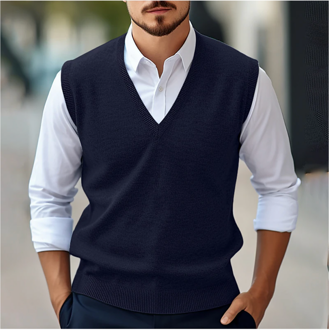 Versatile men's V-neck sweater vest, a cozy knitted layering piece for autumn smart casual outfits.