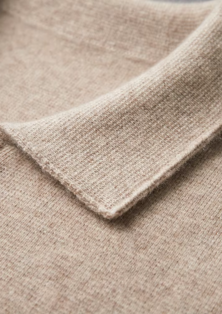 All-season men's smart casual zip-up sweater, great for layering and style.