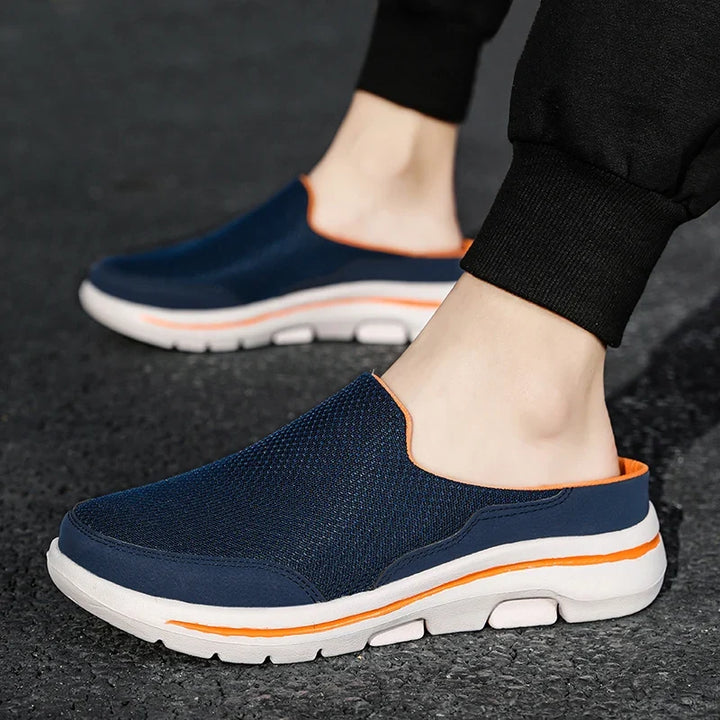 Men's closed-toe slip-on mule sandals for casual comfort and easy wear.