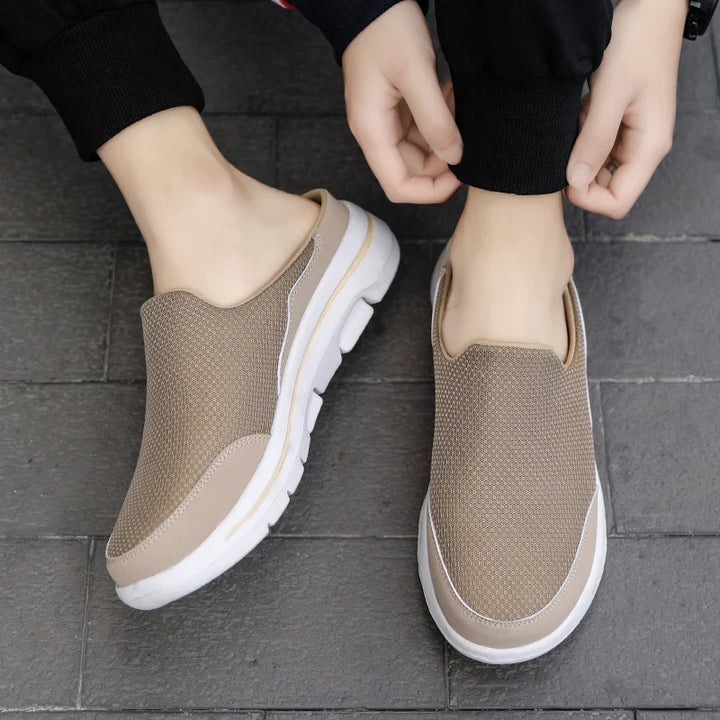 Comfortable men's closed-toe mules, slip-on design, perfect for casual summer footwear.