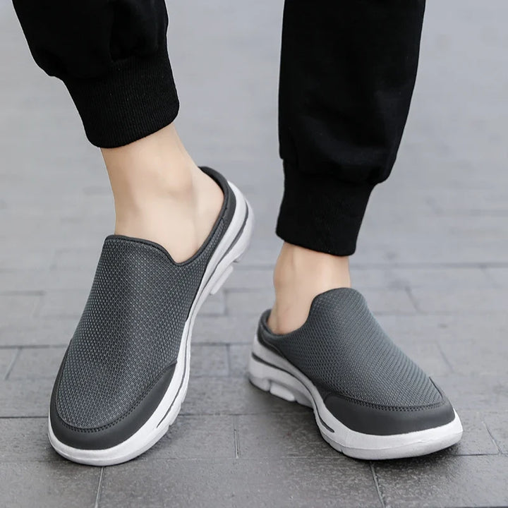 Durable men's slip-on sandals with a closed toe, ideal for casual comfort.